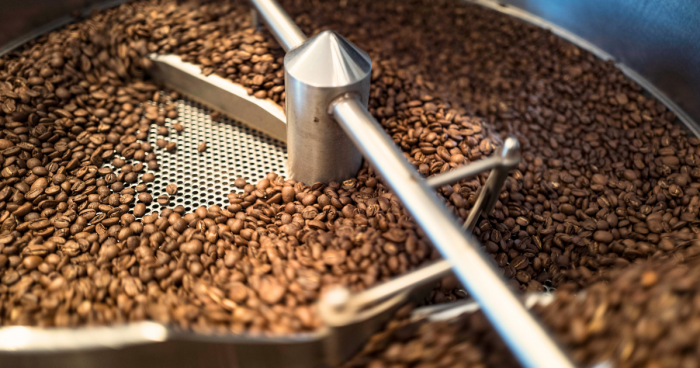 Coffee Being Roasted on a coffee farm before heading to a cup